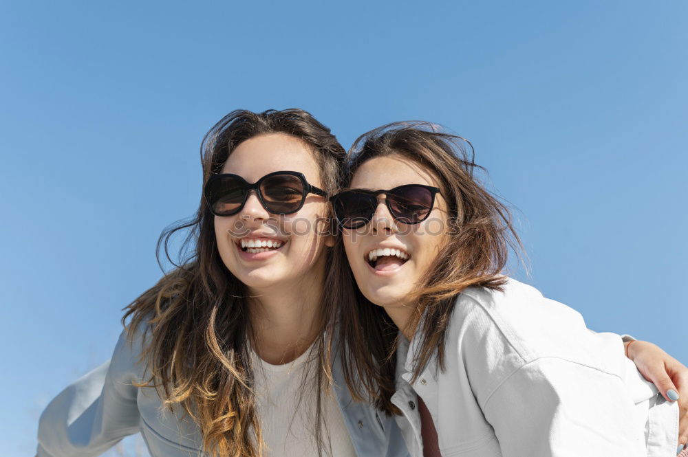 Similar – Image, Stock Photo Young adult hipster girlfriends taking selfie and pulling faces