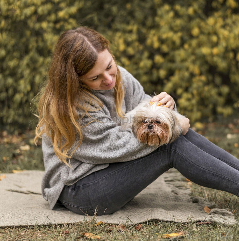 Similar – Woman with dog in the city