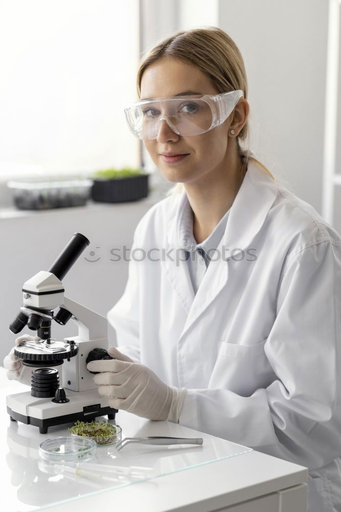 Similar – Image, Stock Photo Woman looking at microscope