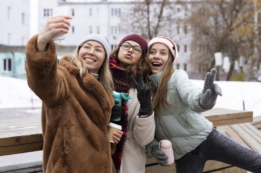 Similar – Lifestyle sunny image of best friend girls taking selfie