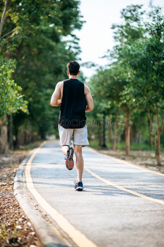 Similar – Image, Stock Photo Athletic young woman jogging along a forest track