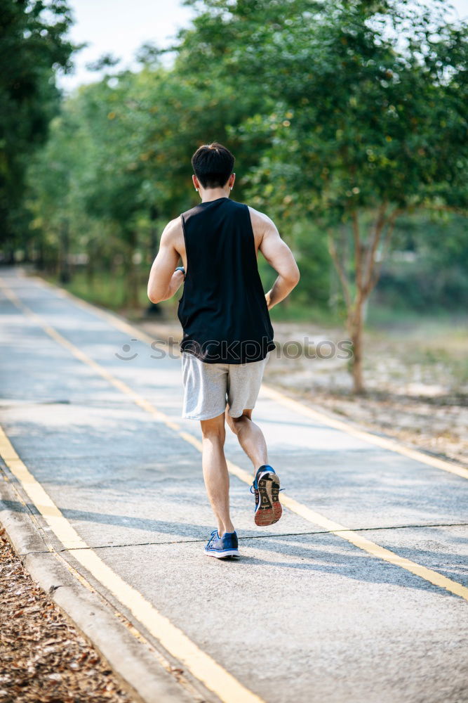 Similar – Image, Stock Photo Athletic young woman jogging along a forest track