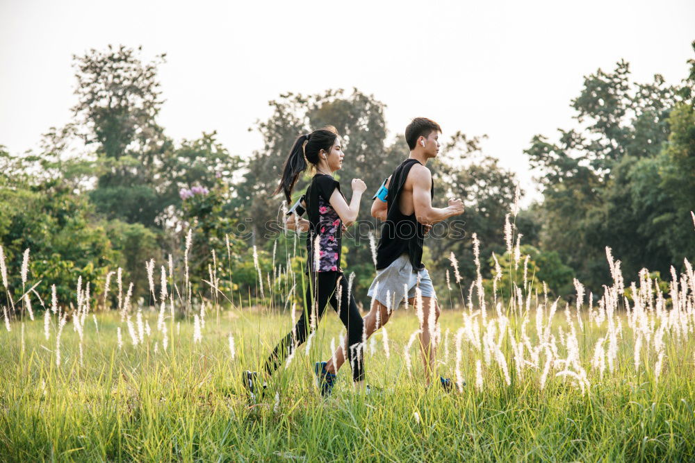 Similar – Image, Stock Photo Couple doing trekking looking with binoculars