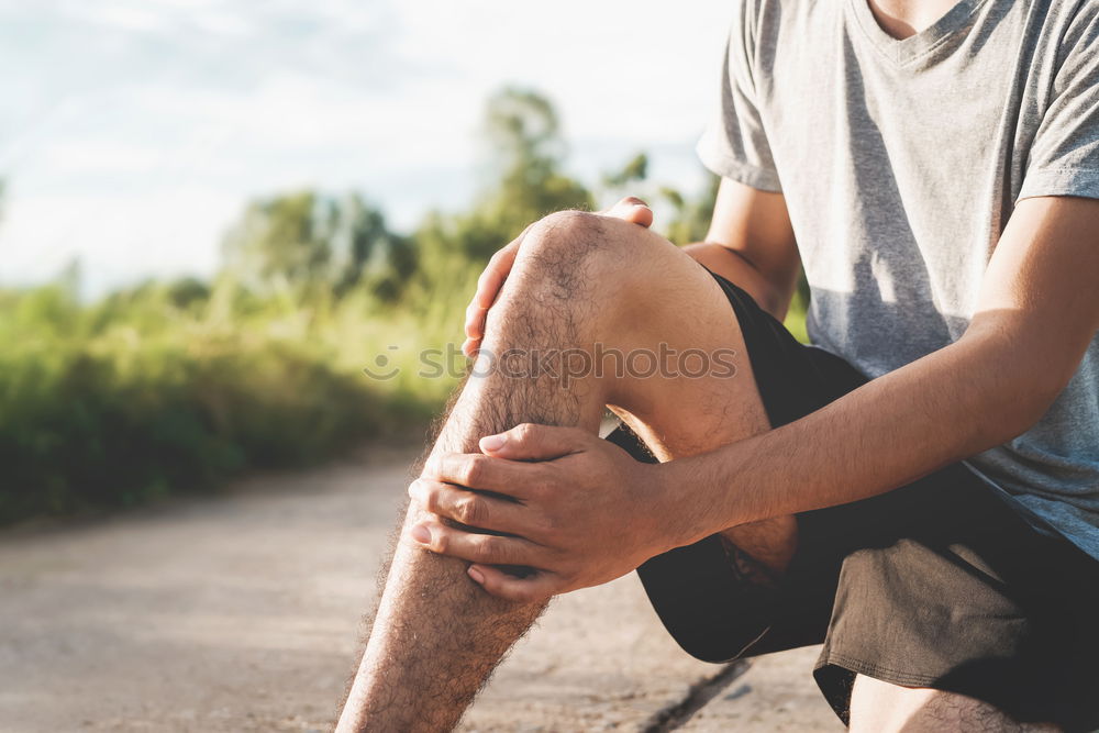 Similar – Image, Stock Photo Young man doing stretching exercises