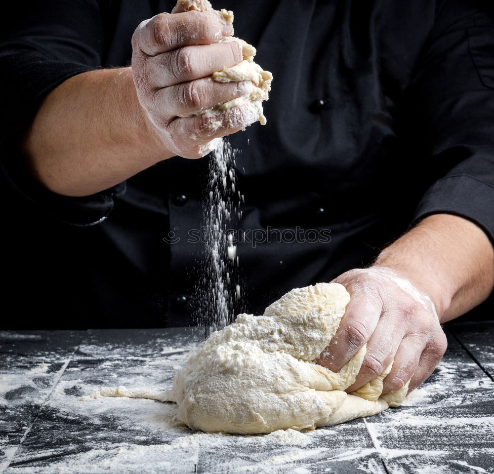 Similar – Image, Stock Photo spoon with white wheat flour in the male hands of a cook