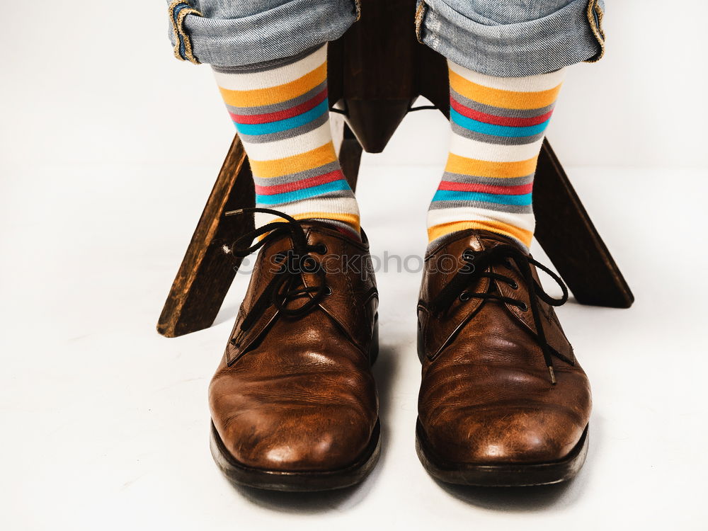 Similar – stylish men’s socks. Stylish suitcase, men’s legs, multicolored socks and new shoes. Concept of style, fashion, beauty and vacation