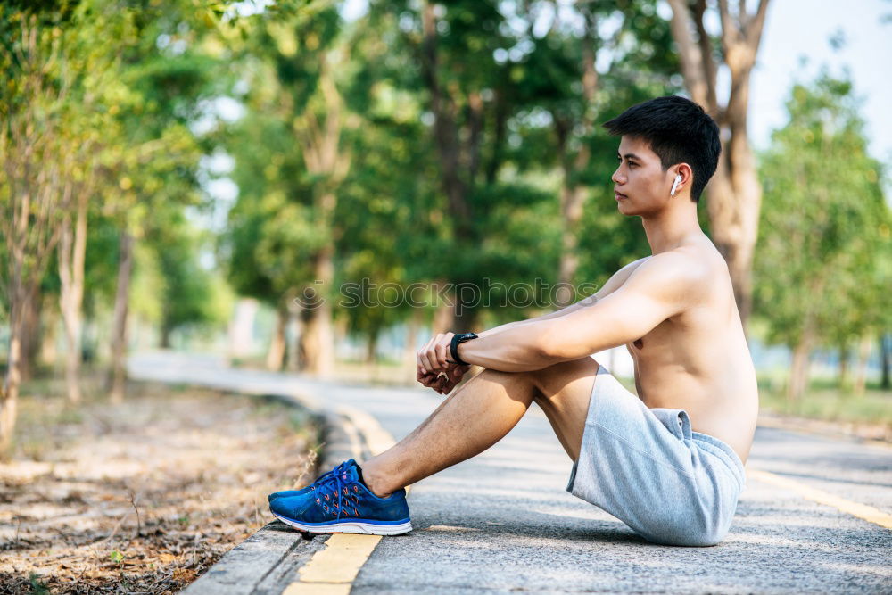 Similar – Image, Stock Photo Young man working out doing push-ups on a wooden park bench