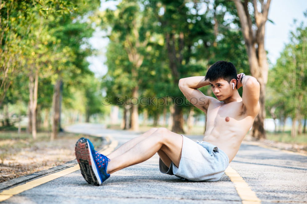 Similar – Image, Stock Photo Young sports man sitting at staircase with water bottle break