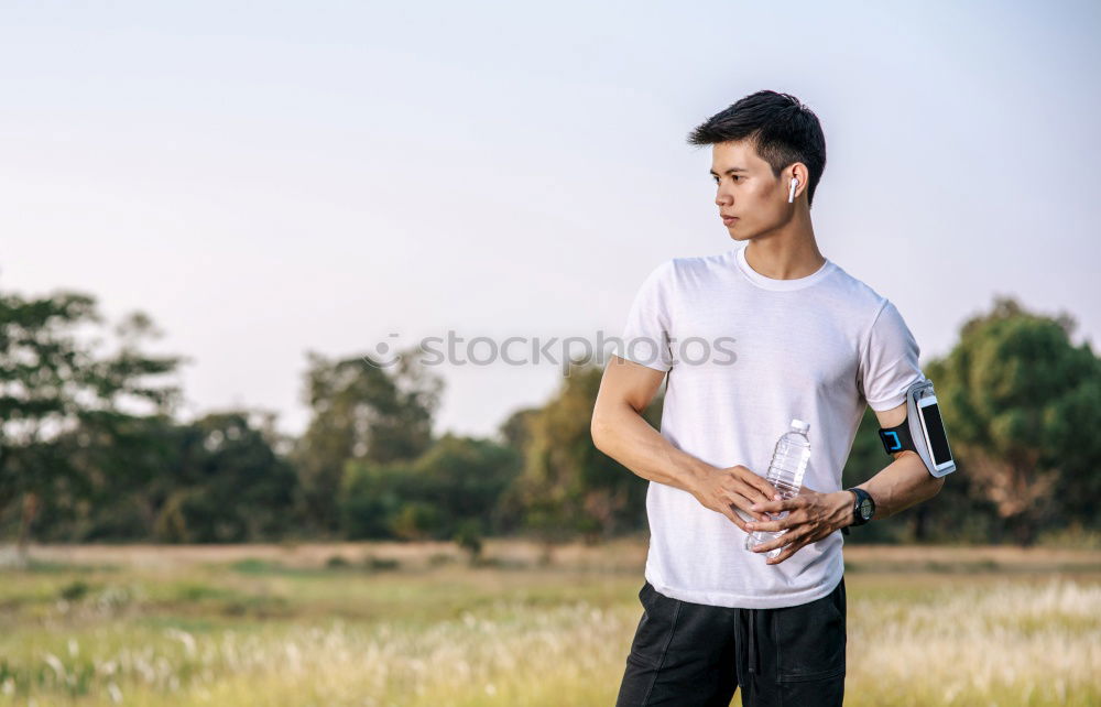 Similar – Image, Stock Photo Young man doing stretching exercises