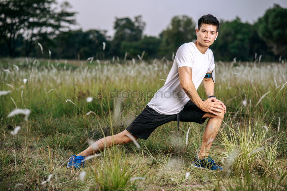 Similar – Image, Stock Photo Young sports man sitting at staircase with water bottle break