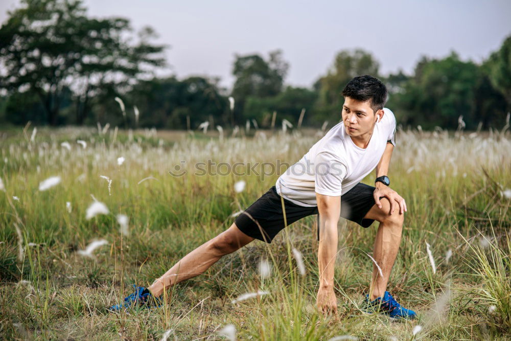 Similar – Image, Stock Photo Young man working out doing push-ups on a wooden park bench