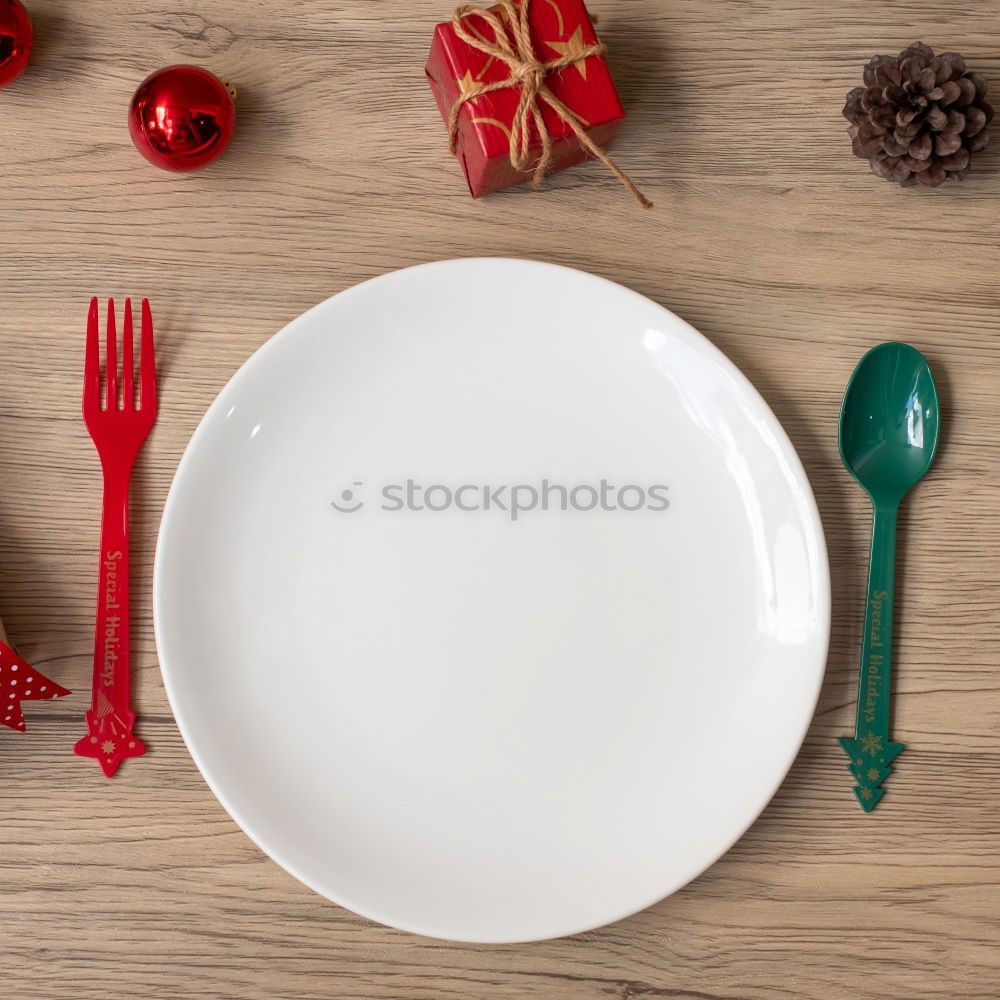 Similar – Image, Stock Photo The letters HUNGER on a plate with knife and fork and napkin and a glass of water