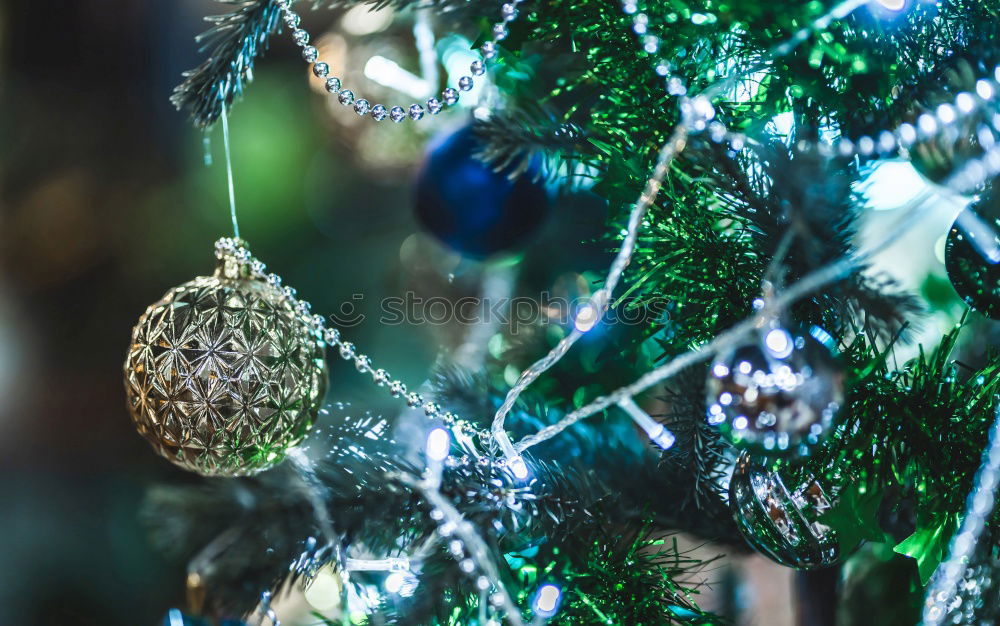 Similar – Christmas decoration with sparkler, lights and pine twigs