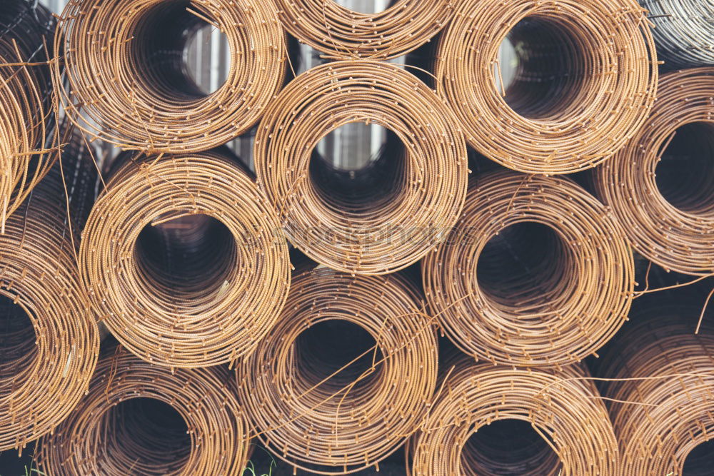 Similar – Rusty iron pipes wrapped with steel cable