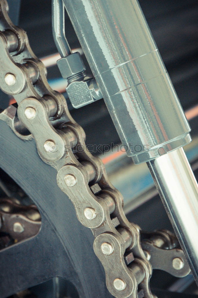 Similar – Image, Stock Photo Mechanic fixing custom motorcycle wheel