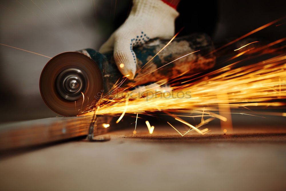 Similar – Image, Stock Photo Traditional style blacksmith at work. Hammer hands and iron.