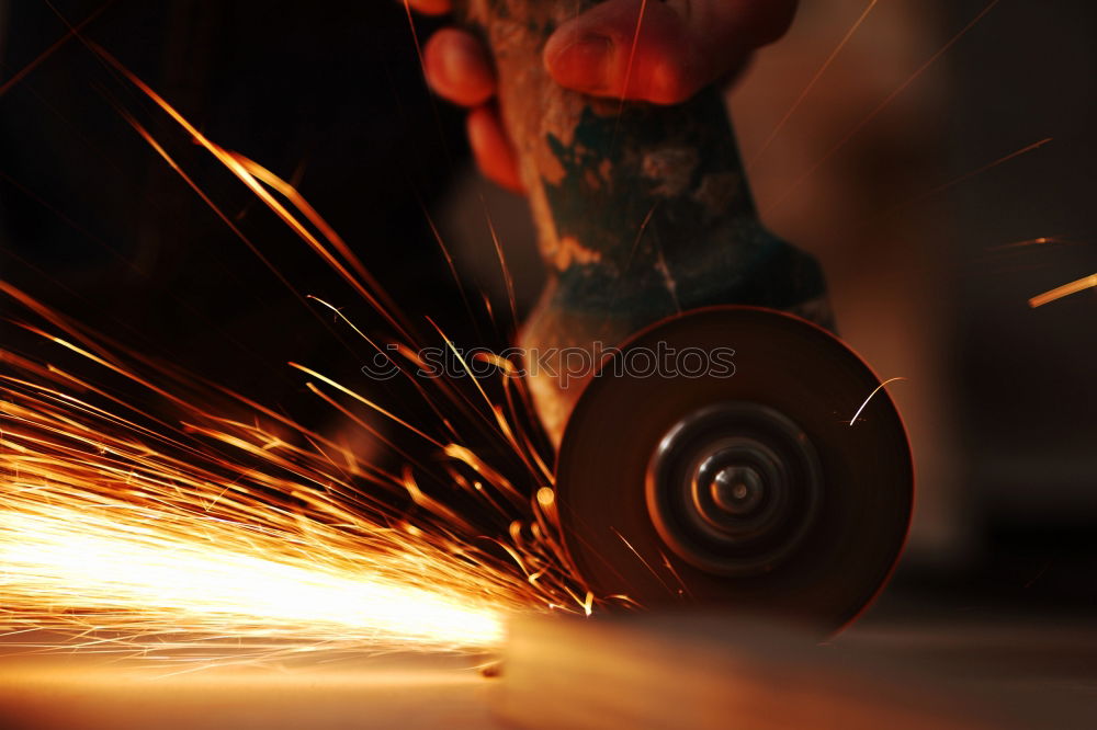 Similar – Image, Stock Photo Man cutting iron