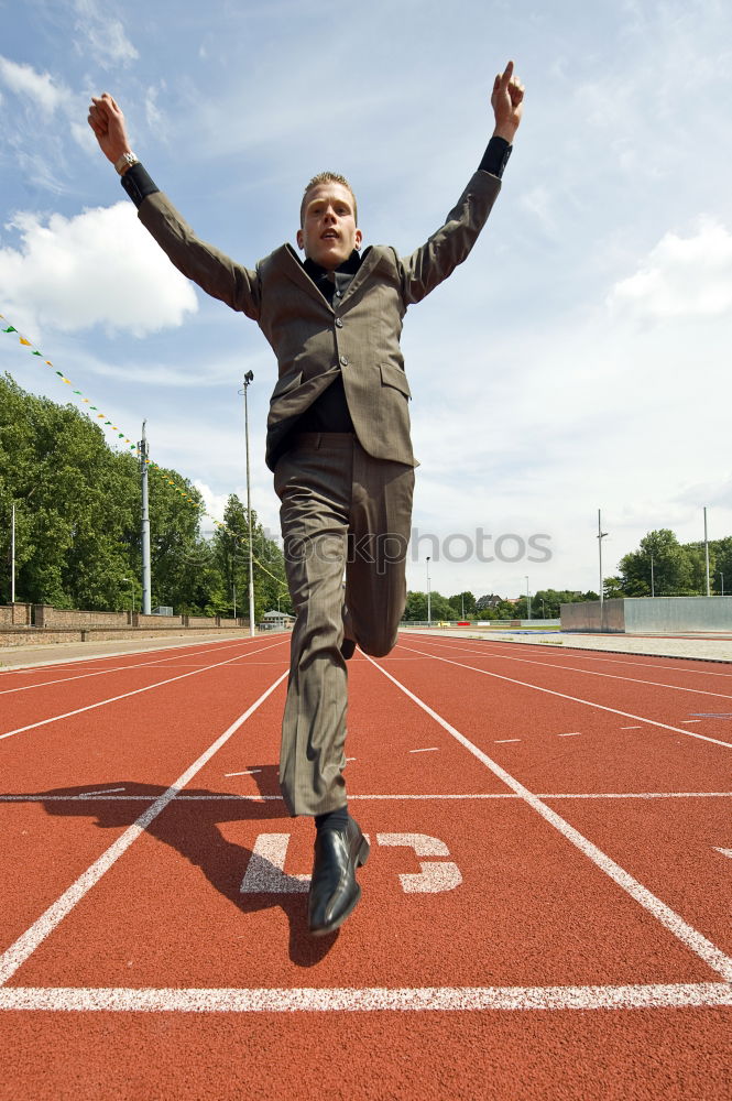 Similar – Image, Stock Photo Sportsman jumping over a hurdle