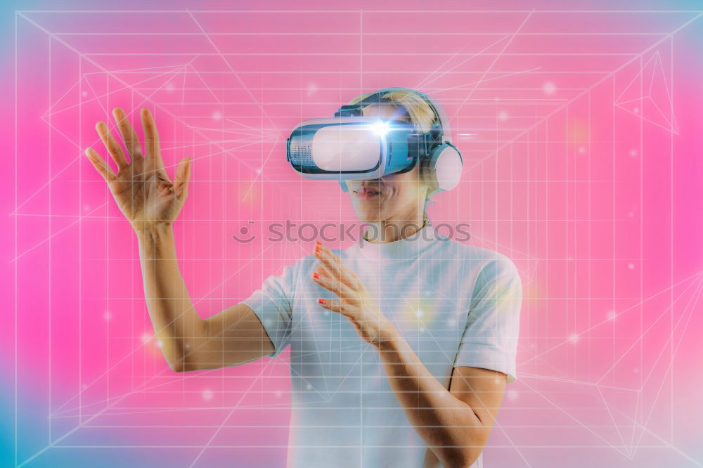 Similar – Image, Stock Photo Boy with virtual reality glasses on colorful background. Future technology, VR concept