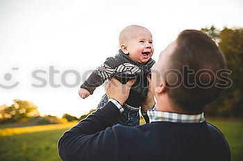 Similar – young dad and son playing outdoors at sunset. family concept