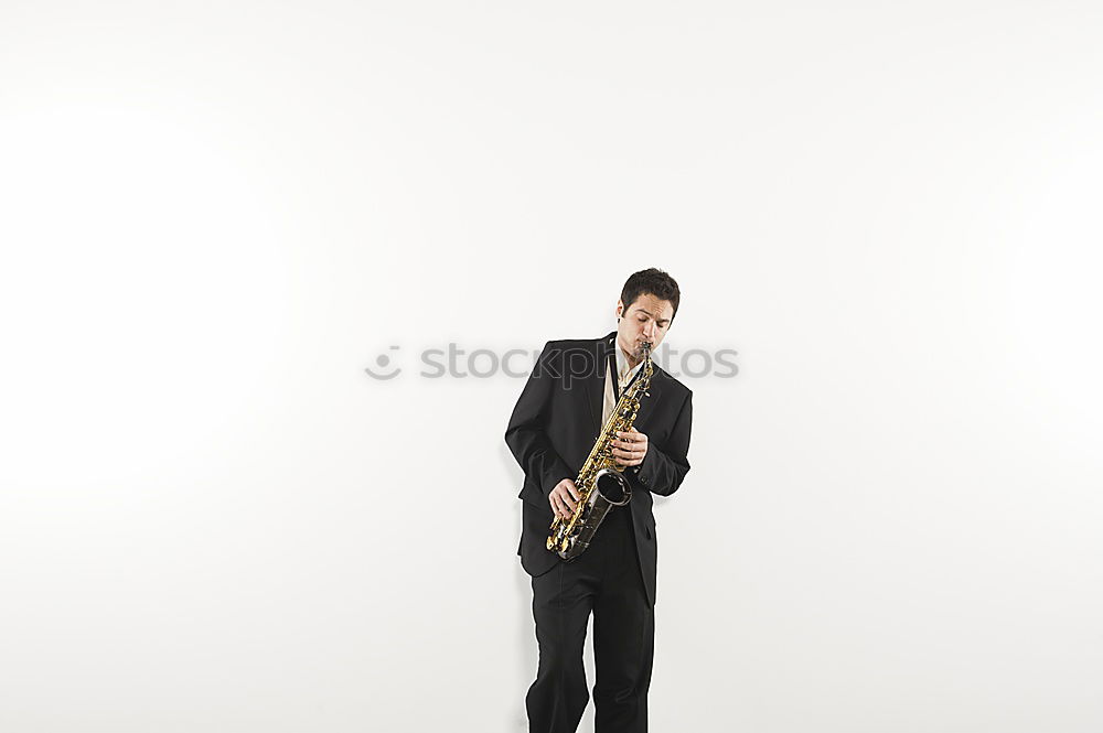 Similar – Smiling jazzman with sax