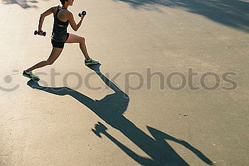 Image, Stock Photo Athletic woman running up stairs during cardio