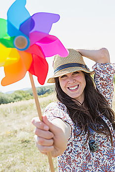 Similar – Young happy woman holding a heart shaped balloon