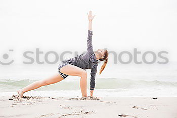 Similar – Yoga on the beach