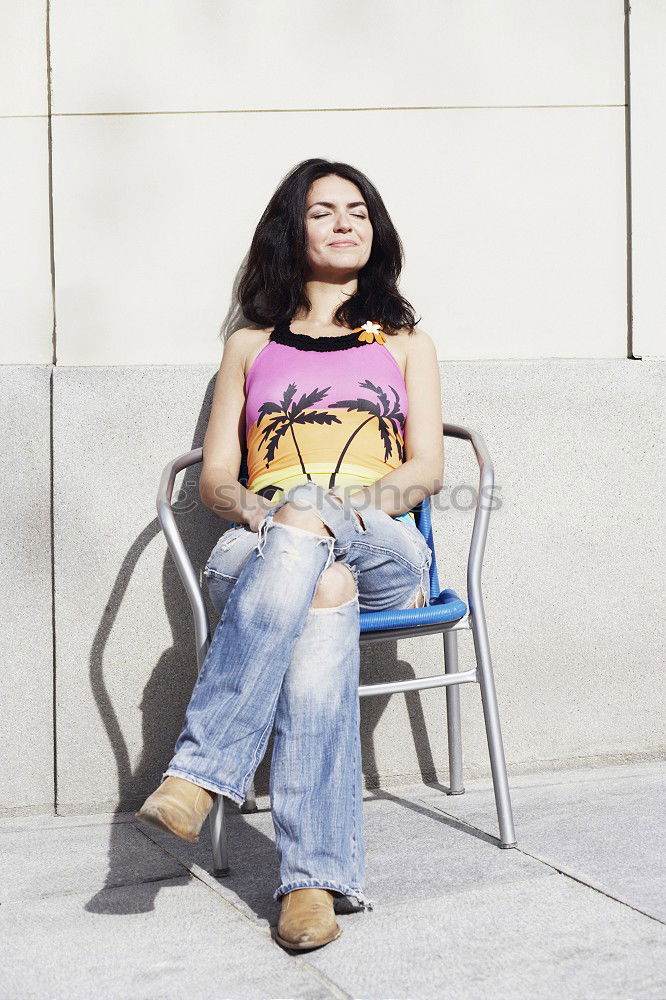 Similar – A young woman sitting on a garden bench