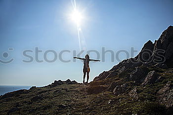 Similar – A young person on the beach of Hiddensee in bright sunshine