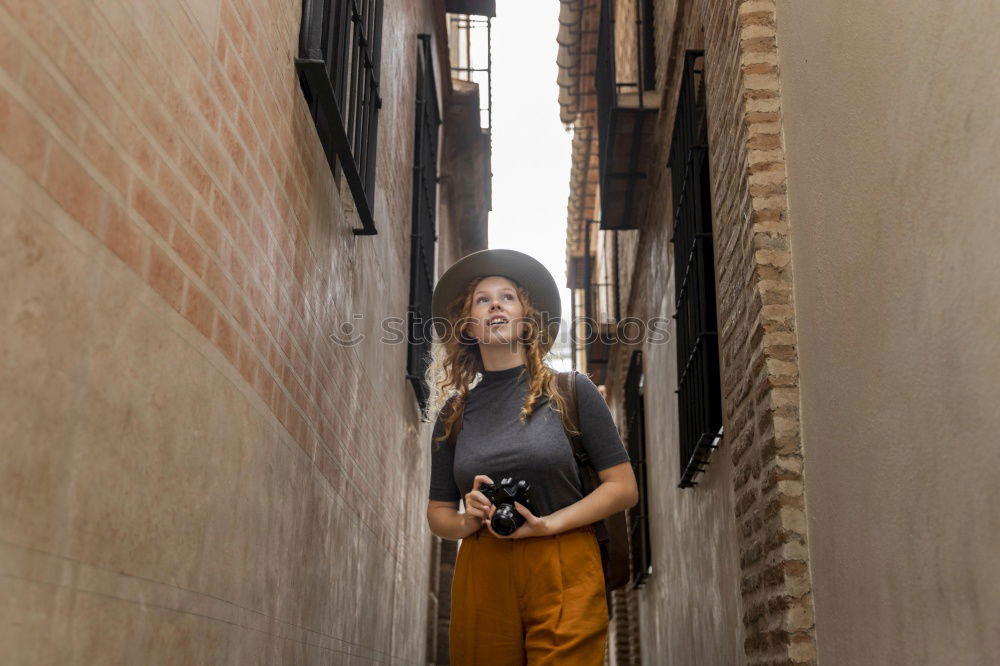 Similar – Image, Stock Photo Smiling woman in alley