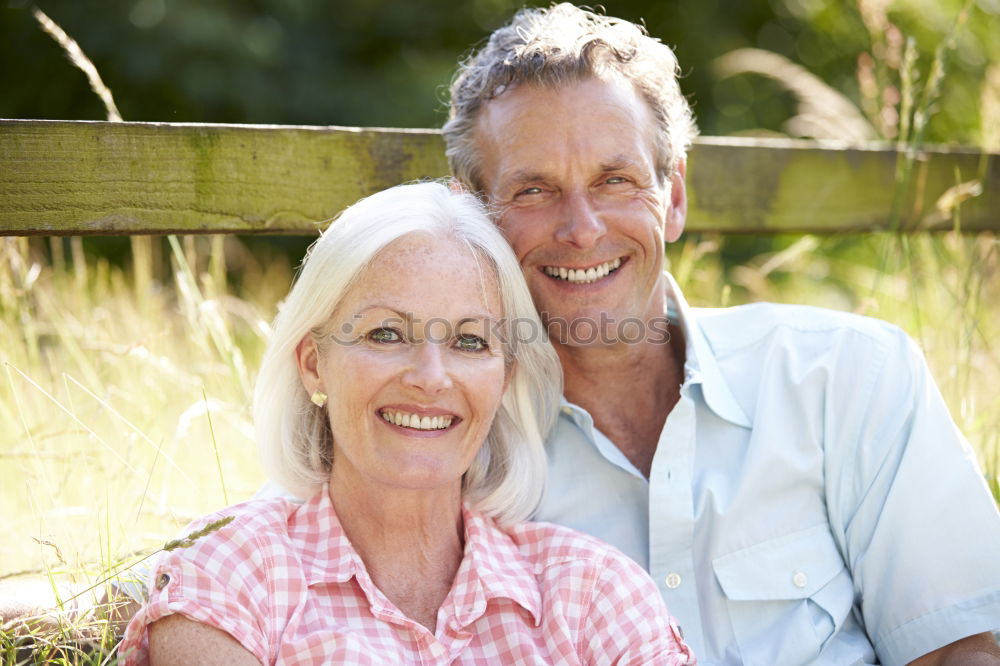 Similar – Retired couple in the green