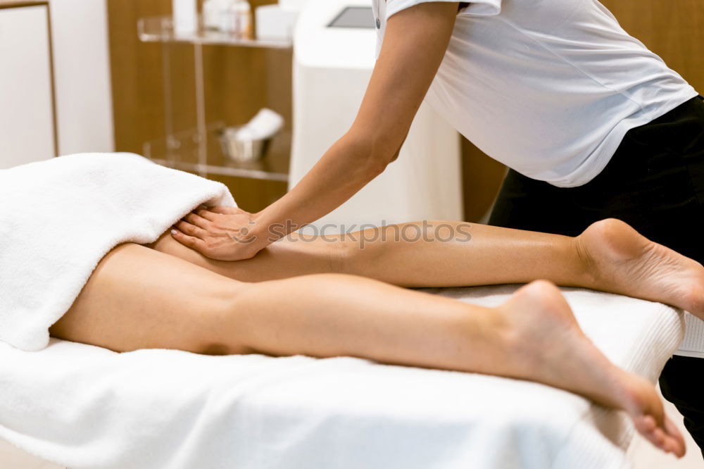 Similar – Image, Stock Photo Woman receiving massage on shoulders in clinical center