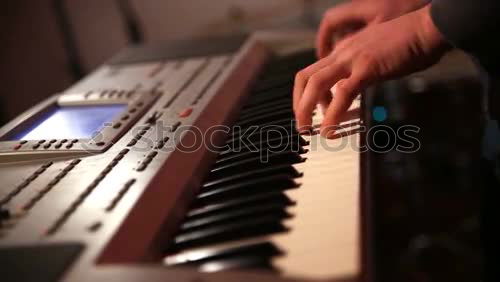 Similar – Image, Stock Photo Concert grand piano on parquet floor with keys and pedals in partial view oblique from above with shallow depth of field