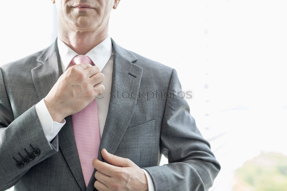 Similar – Image, Stock Photo Man buttoning up shirt sleeve