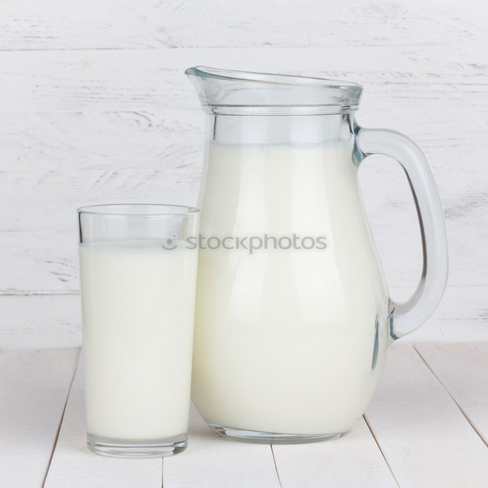 Similar – Flasche mit Milch und Glas Milch