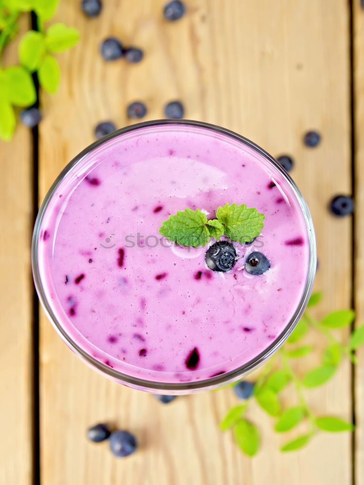 Blueberry smoothie or milkshake in a jar