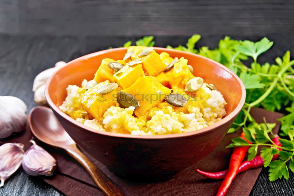 Similar – Image, Stock Photo Risotto with a pumpkin and bacon