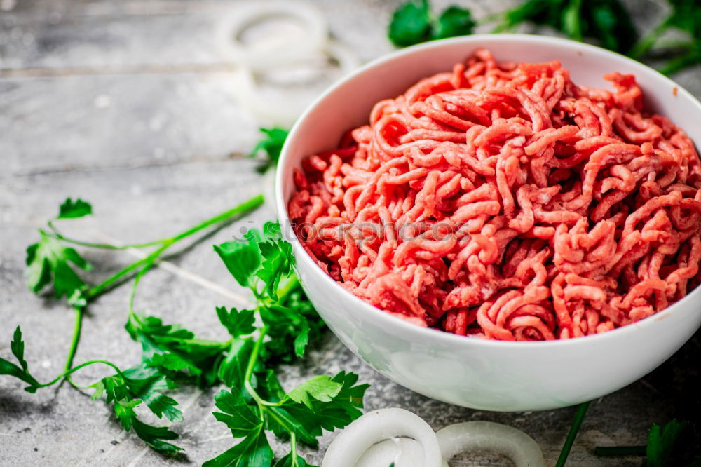 Similar – Image, Stock Photo Prepare organic minced meat with fresh ingredients