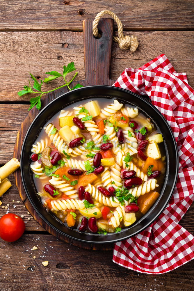 Similar – Image, Stock Photo Spicy Cooking . Frying pan with onion, garlic and chili