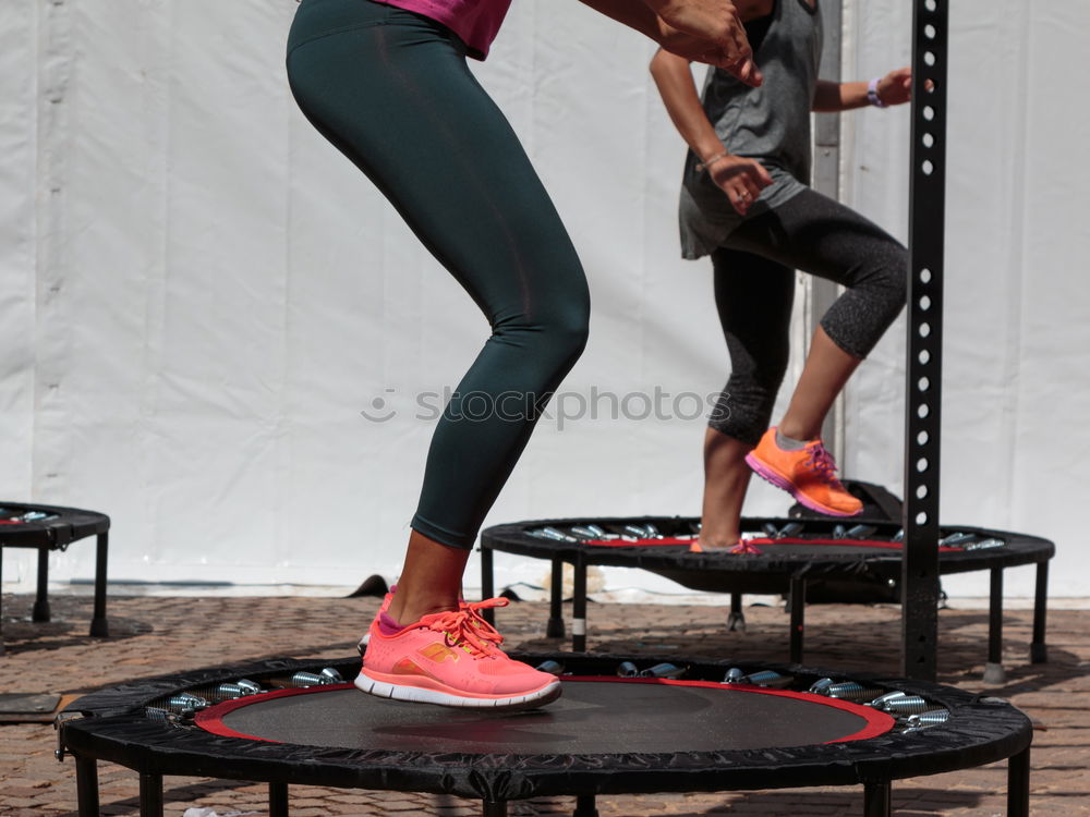 Similar – Image, Stock Photo Couple doing exercises over steps in fitness center