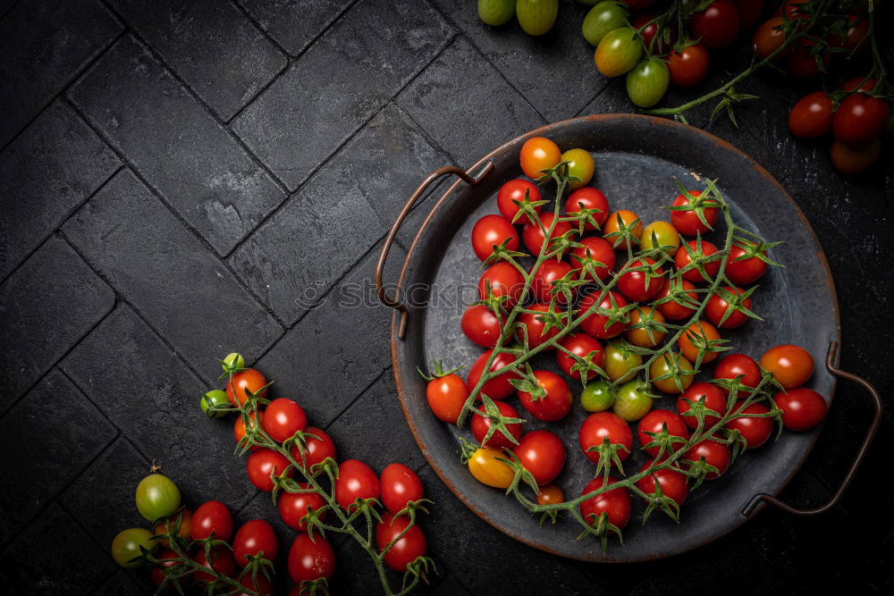 Similar – Image, Stock Photo Tasty strawberries in black colander bowl on dark rustic kitchen table. Copy space. Seasonal organic food. Healthy eating and cooking