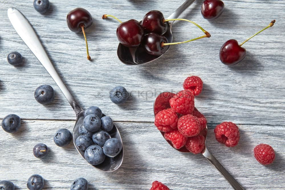 Similar – Image, Stock Photo Blue and raspberries on slate plate