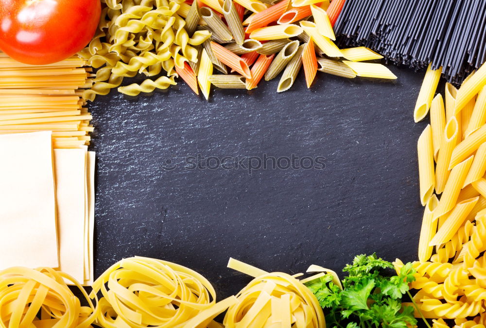 Similar – pasta spaghetti on black background