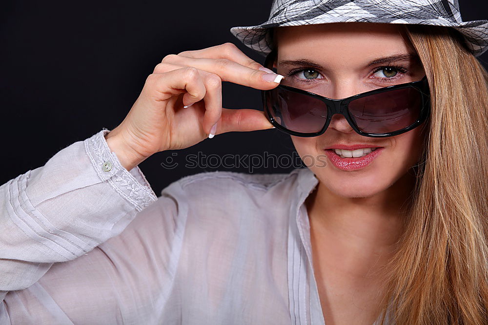 Similar – Portrait of Smiling senior woman with vintage photo camera on gray background