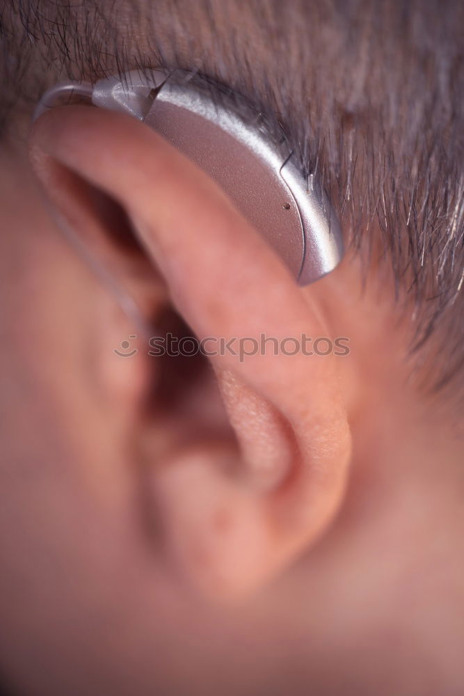 Similar – Image, Stock Photo Person with piercing and earphones