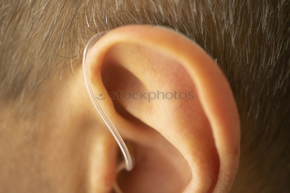 Image, Stock Photo Person with piercing and earphones