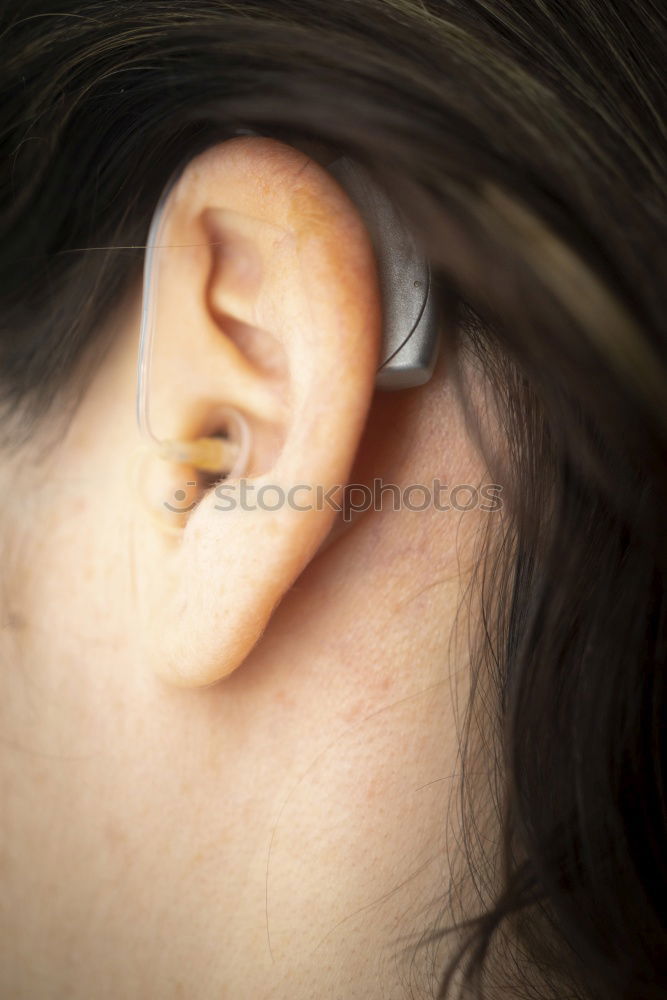 Similar – Image, Stock Photo Person with piercing and earphones