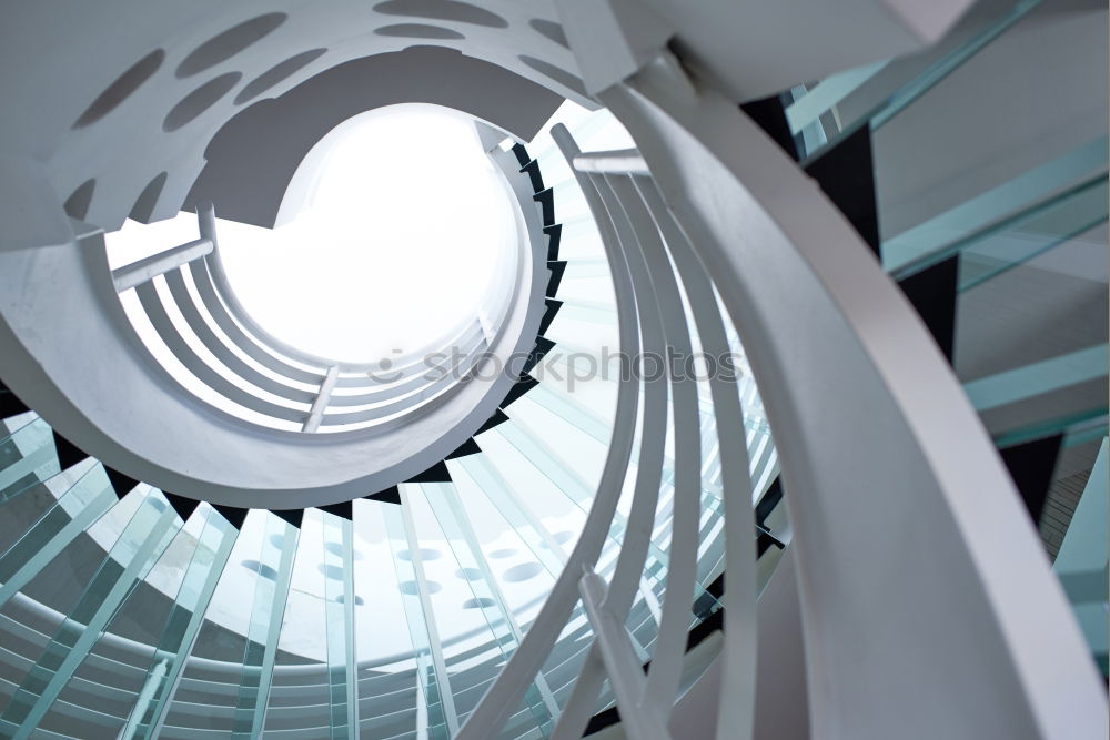 Similar – Spiral staircase into the light