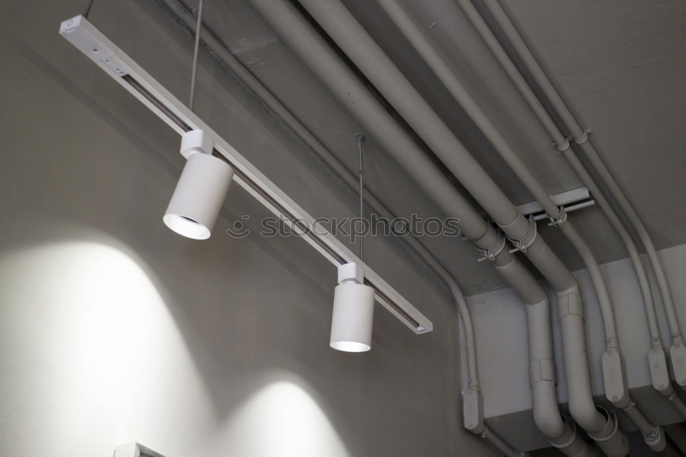 Similar – Image, Stock Photo Air duct, wiring and plumbing in the mall. Air conditioner pipe, wiring pipe, and plumbing pipe system. Building interior concept.